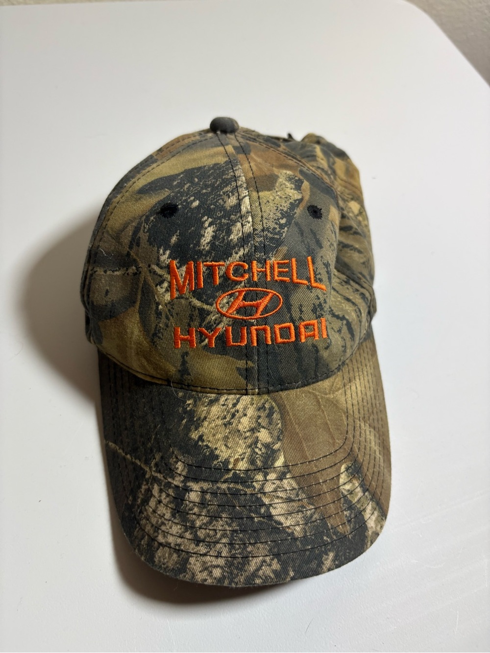 Port Authority Camo Baseball Cap with Orange Embroidery